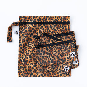 Roamio by Bumkins The Commuter Essential 4-Piece Set: Leopard lays stacked on a white background.