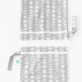 Bumkins Wet Bag + Wet/Dry Bag Set: Lunar Phase is vertically arranged on a white background with only the top half of the bags visible.