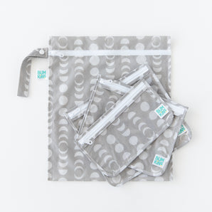 The Bumkins Lunar Phase 3 Pack set—including wet, clear, and tote bags—is stacked on a white background.