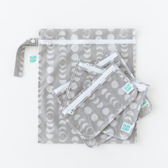 The Bumkins Lunar Phase 3 Pack set—including wet, clear, and tote bags—is stacked on a white background.