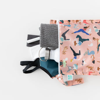 Bumkins Wet Bag: Yoga Pals holds a gray towel, water bottle, and gym clothing on a white background.