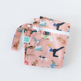 Bumkins Wet Bag: Yoga Pals lays folded on a white background.