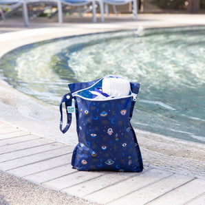 The Bumkins Wet Bag + Clear Travel Bag 3 Pack Set: Evil Eye keeps poolside parents organized with stylish reusable bags.