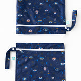 Bumkins Wet Bag + Wet/Dry Bag Set: Evil Eye is vertically arranged on a white background with only the top half of the bags visible.
