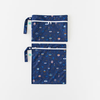 Bumkins Wet Bag + Wet/Dry Clutch Set: Evil Eye is neatly arranged on a white background.
