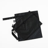 Roamio by Bumkins Wet Bag + Wet/Dry Clutch Set: Rich Black is arranged on a white background.