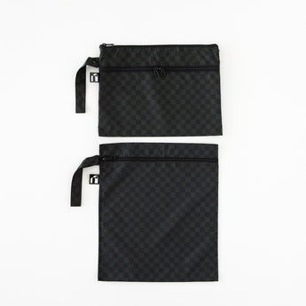 Roamio by Bumkins Wet Bag + Wet/Dry Clutch Set: Rich Black is neatly arranged on a white background.
