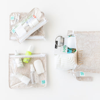 Bags from Bumkins The Chaos Coordinator Deluxe 5-Piece Set: Wander hold toiletries and travel essentials on a white background.