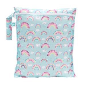 Bumkins Wet Bag: Rainbows features a colorful rainbow and cloud design on light blue waterproof fabric with a side handle and zipper closure.