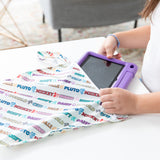 A child places a tablet in a bag from Bumkins On-The-Go Mealtime 7-Piece Set: Mickey & Friends MVP on a white table.