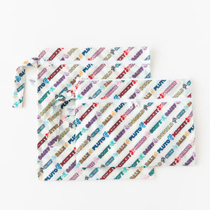 Two bags from Bumkins The Chaos Coordinator Deluxe 5-Piece Set: Disney Mickey & Friends Varsity lay overlapped on a white background.