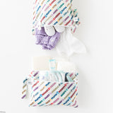 Bumkins Wet Bag + Wet/Dry Clutch Set: Disney Mickey & Friends Varsity holds clothes, diapers, and baby essentials on a white background.
