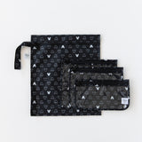 Bumkins The Chaos Coordinator Essential 4-Piece Set: Mickey Mouse Icon Black + White lays overlapped on a white background.