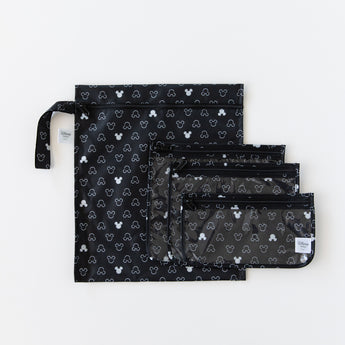 Bumkins The Chaos Coordinator Essential 4-Piece Set: Mickey Mouse Icon Black + White lays overlapped on a white background.