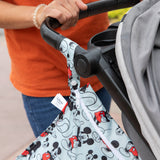 Close up of a Bumkins Wet Bag: Mickey & Friends Forever attached to the handle.