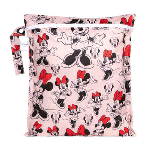 Bumkins Wet Bag: Minnie Mouse Classic features Minnie Mouse illustrations on pink waterproof fabric with a zipper closure & side handle.
