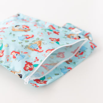 Close-up of Bumkins Wet Bag: Disney Princess Ariel partially open on a white background, showcasing the interior.