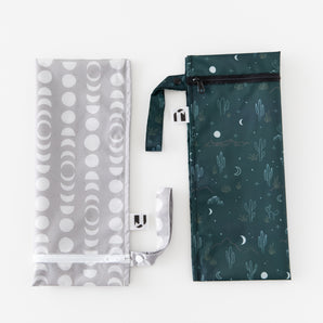 The Roamio by Bumkins Wet Bag 2 Pack: Desert Night offers a reusable, waterproof, zippered alternative to single-use plastic.
