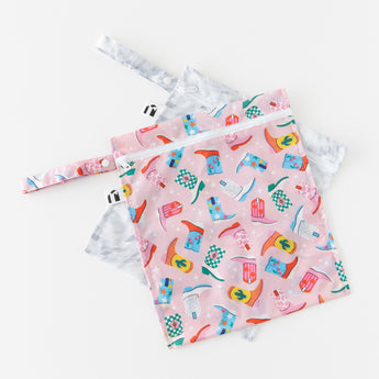 Roamio by Bumkins Wet Bag 2 Pack: Disco Boots lays stacked on a white background.