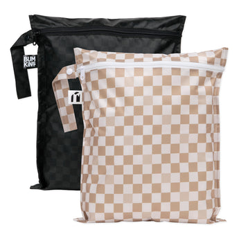 Bumkins Wet Bag 2 Pack: Sand and Black Check—2 waterproof bags, one black checkered & one tan checkered, with zipper closure and side handle.