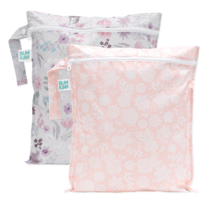 Bumkins Wet Bag 2 Pack: Floral and Lace includes 2 waterproof bags with floral patterns, zipper closure, and side handle.