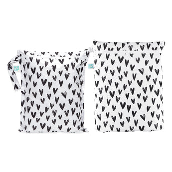 Bumkins Wet Bag + Wet/Dry Bag Set: Hearts—stylish reusable pouches for essentials, featuring black heart patterns.