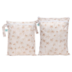 The Bumkins Wet Bag + Wet/Dry Bag Set: Palm Daze keeps you organized with stylish, reusable beige pouches featuring palm prints.