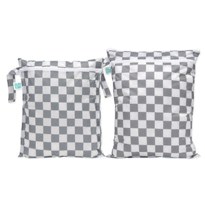 The Bumkins Wet Bag + Wet/Dry Bag Set in Charcoal Check features two reusable bags with a gray and white checkerboard design.