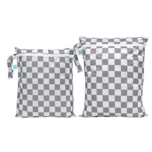 The Bumkins Wet Bag + Wet/Dry Bag Set in Charcoal Check includes small and large reusable waterproof zipper bags for packing essentials.