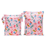 Bumkins Wet Bag + Wet/Dry Bag Set: Boots—2 pink waterproof bags with a colorful cowboy boot pattern and white zippers.