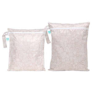 The Bumkins Wet Bag + Wet/Dry Bag Set: Wander features beige bags with white patterns, zippers, and handles—eco-friendly packing.