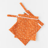 Bumkins Wet Bag + Wet/Dry Bag Set: Grounded lays stacked on a white background.
