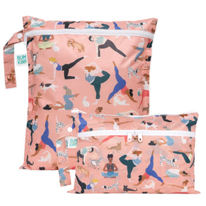 Bumkins Wet Bag + Wet/Dry Clutch Set: Yoga Pals—two zippered pink waterproof bags with illustrations of people and animals in yoga poses.