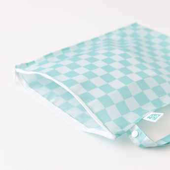 A teal Bumkins Wet Bag Plus 2 Pack: Mint + Charcoal Check lays open on a white background.