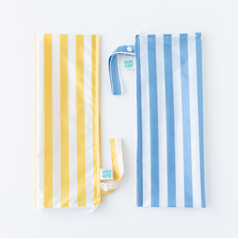 Bumkins Wet Bag Plus 2 Pack: Blue + Yellow Stripe lays folded on a white background.