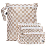 Bumkins The Chaos Coordinator Essential 4-Piece Set: Sand Check includes 4 tan checkered waterproof bags with zipper closures.