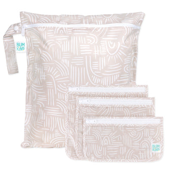 Bumkins Wet Bag + Clear Travel Bag 3 Pack Set: Wander—beige bags with white patterns, perfect for organized travel.