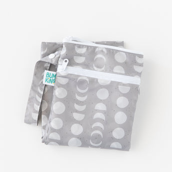 The Bumkins Wet Bag + Wet/Dry Bag Set: Lunar Phase is waterproof and reusable—ideal for packing with a moon phase pattern.