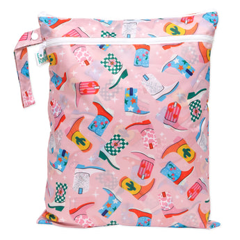 Bumkins Wet/Dry Bag: Boots has colorful cowboy boot designs on pink waterproof fabric.