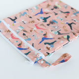 Bumkins Wet/Dry Bag: Yoga Pals rests on a white background with the loop handle angled toward the camera.