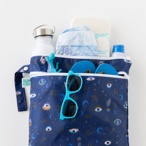 The Bumkins Wet Bag + Wet/Dry Bag Set: Evil Eye keeps essentials—sunglasses, water bottle, and more—organized and visible.
