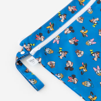 Close-up of Bumkins Wet/Dry Bag: Mickey & Friends Forever on a white background, showcasing the zipper and snap button strap.