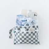 A bag from Bumkins On-The-Go Mealtime 6-Piece Set: Charcoal Check + Grey holds baby essentials on a white background.