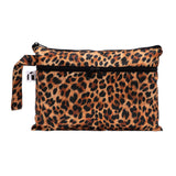 Roamio by Bumkins Wet/Dry Clutch: Leopard is made of leopard print waterproof fabric with two zippered compartments and side handle.