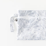 Roamio by Bumkins Wet/Dry Clutch: Disco Check lays flat on a white background.