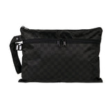 Roamio by Bumkins Wet/Dry Clutch: Rich Black features dual zippers, a handle strap, and black checkered waterproof fabric.