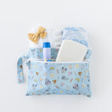 A bag from Bumkins On-The-Go Mealtime 5-Piece Set: Mickey + Minnie Mouse Sunny Side Up Blue holds baby essentials on a white background.