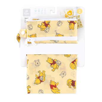 Bumkins Wet/Dry Clutch: Winnie Loves Hunny is shown folded in its packaging.