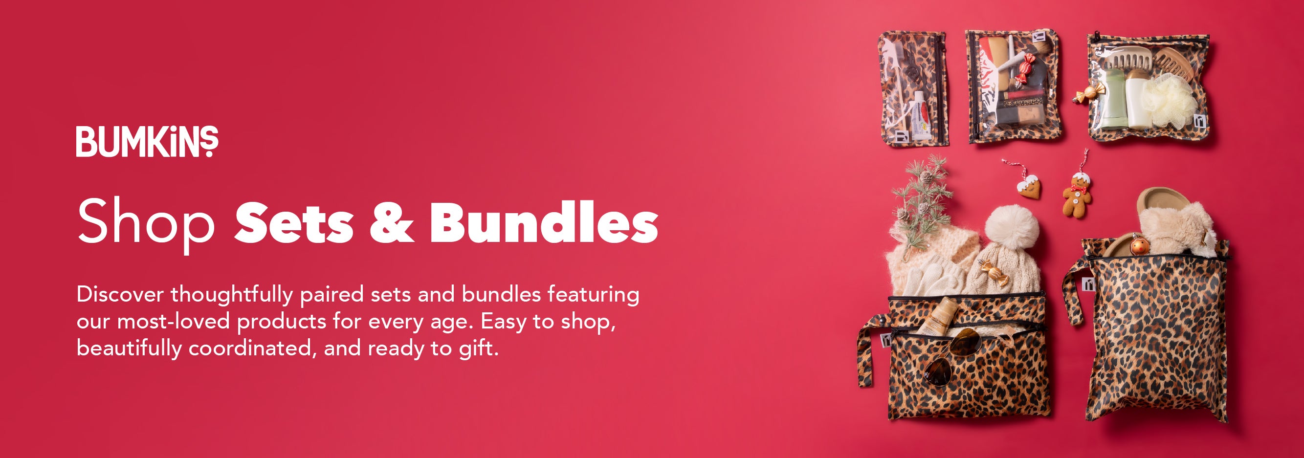 Leopard print bags and pouches with baby items on a red background; Shop Sets & Bundles text on the left.