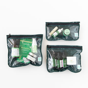 Bumkins Clear Travel Bag 3 Pack: Starry Cactus sits filled with skincare items on a white background.